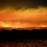 bushfires threaten rural towns in Australian heat wave